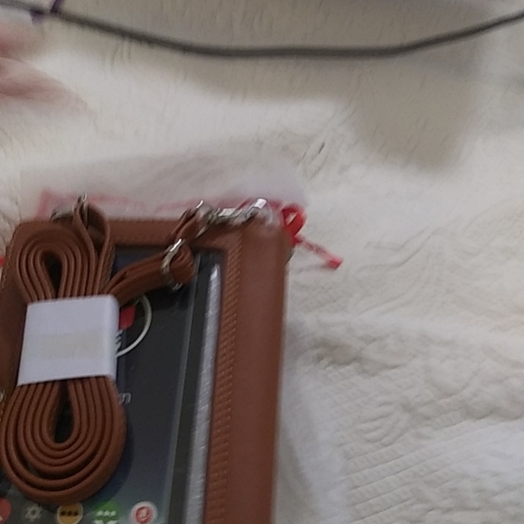 STG hand purse with shoulder strap and slip to put phone. Never used - Picture 7 of 12